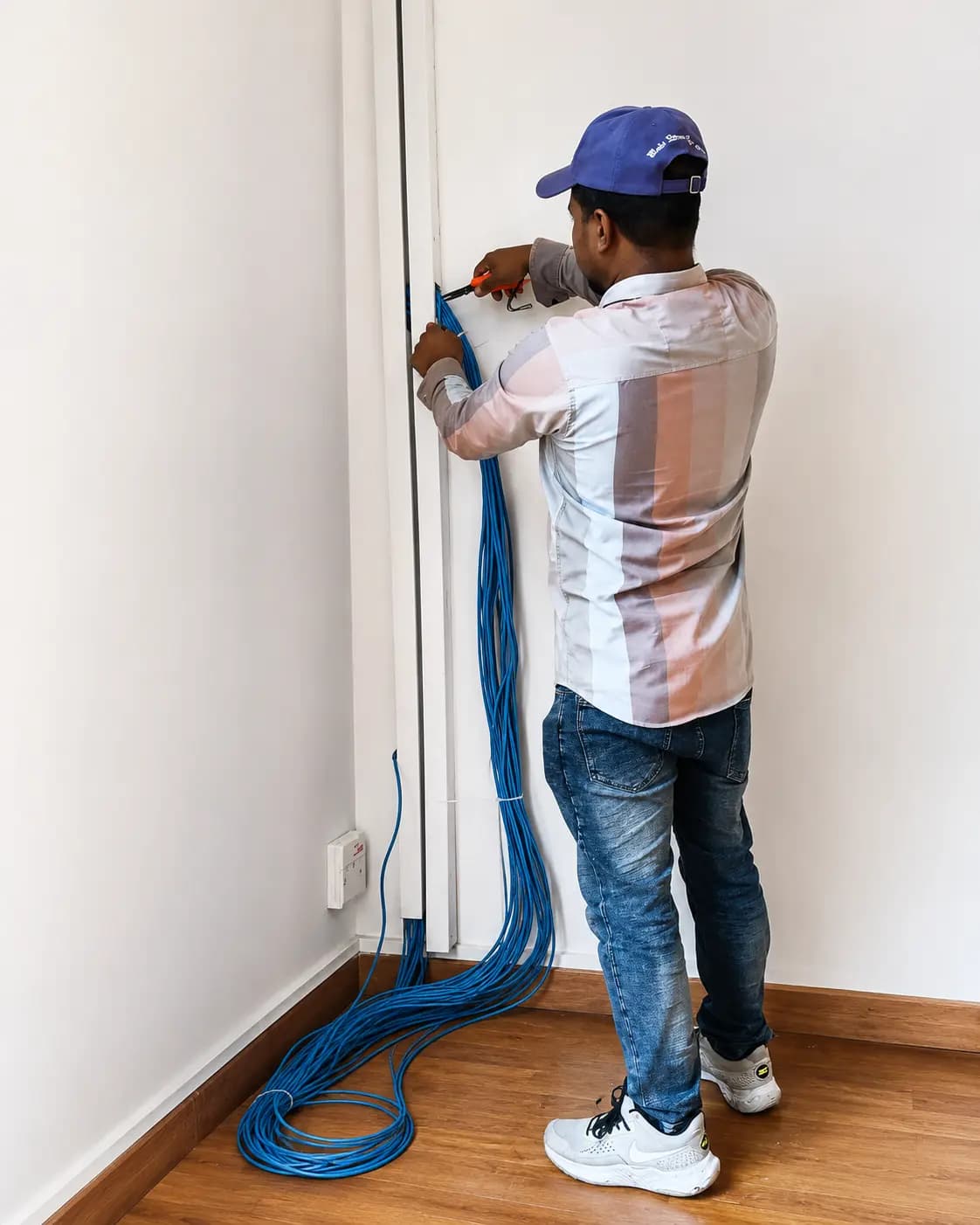 CPL Services technician at work during an office reinstatement project in Singapore